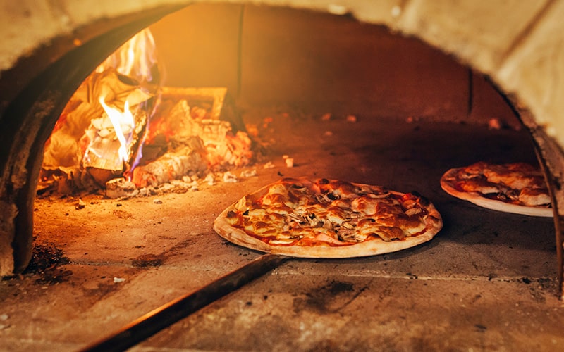 inside of a wood burning pizza oven