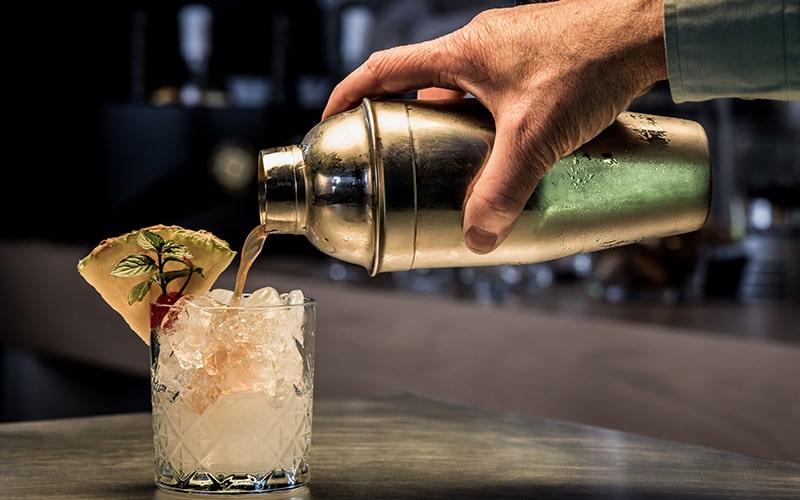 cocktail being poured in a downtown sarasota bar