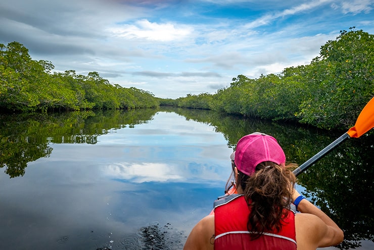 woman kayaking in st lucie inlet preserve state park