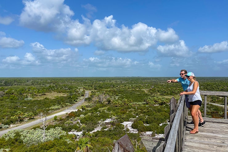 two people on the observation tower in jonathan dickinson state park