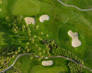 aerial of golf course green and sandtraps in martin county