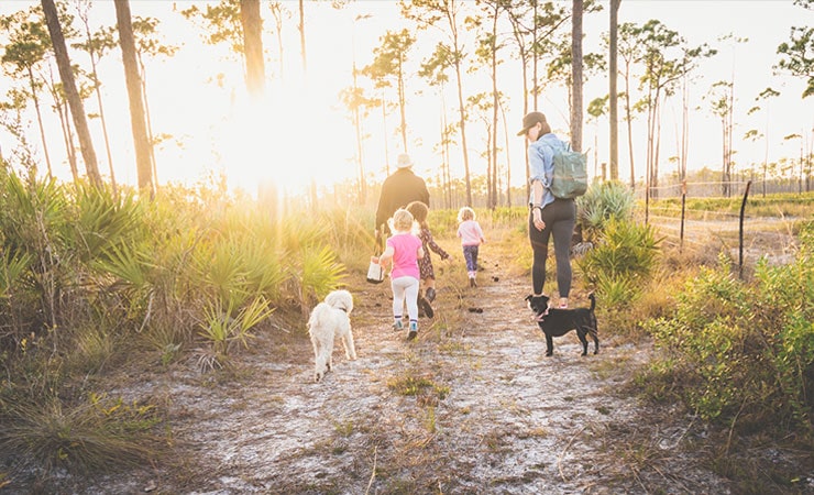 hiking family at Jonathan Dickinson State Park