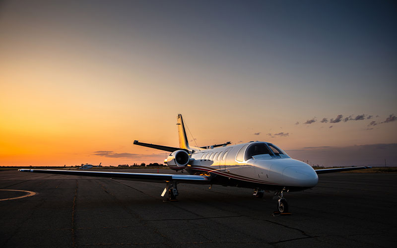 Jet On Tarmac With Sunset