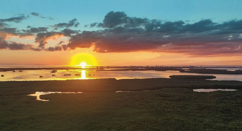 aerial shot of sunset over Estero, Florida