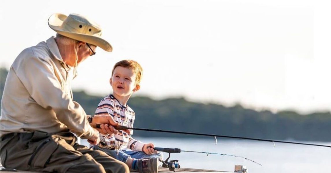 grandpa and grandson fishing together