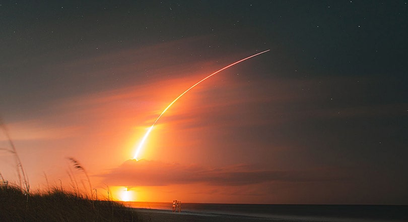 rocket launch at sunset