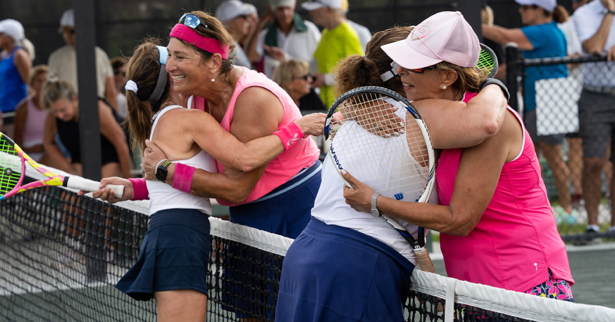 Boca West Racquet Sports - members hugging