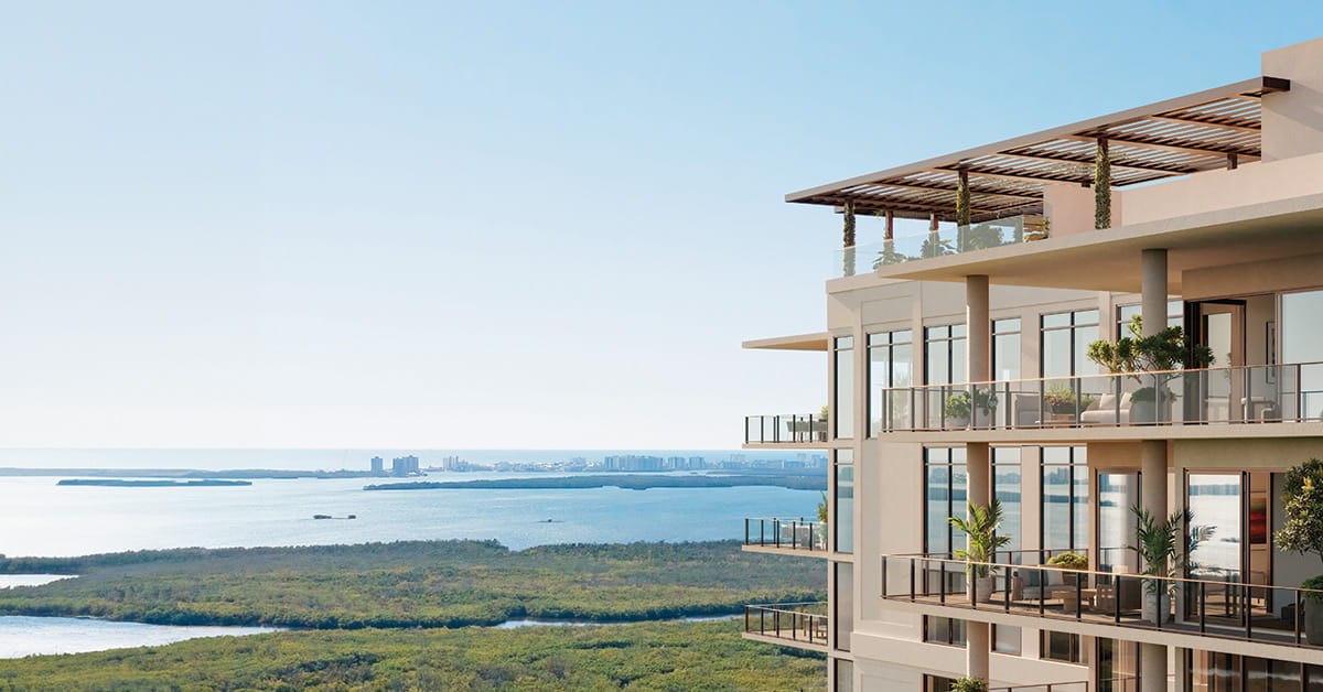 Modern condo balconies overlooking coastal waterway