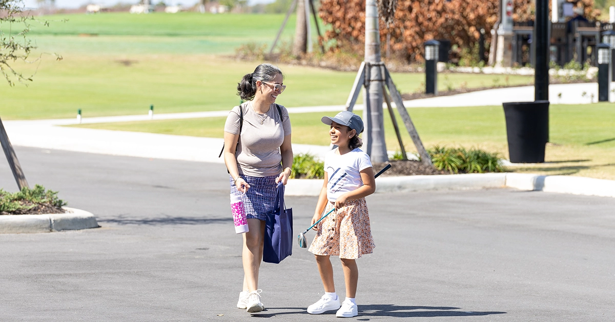 mom and daughter at Glynlea Bus stop